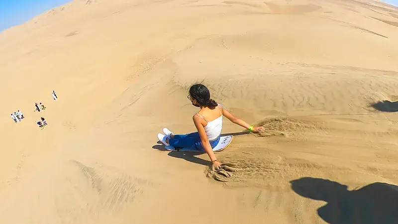 sanboarding en dunas de Ica huacachina full day paracas ica chincha agencia paracas tours peru